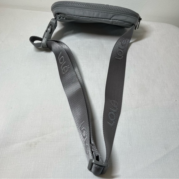 Lole Belt Bag. Minimalist Design. Charcoal Grey. Logo on belt. Adjustable - Picture 2 of 9